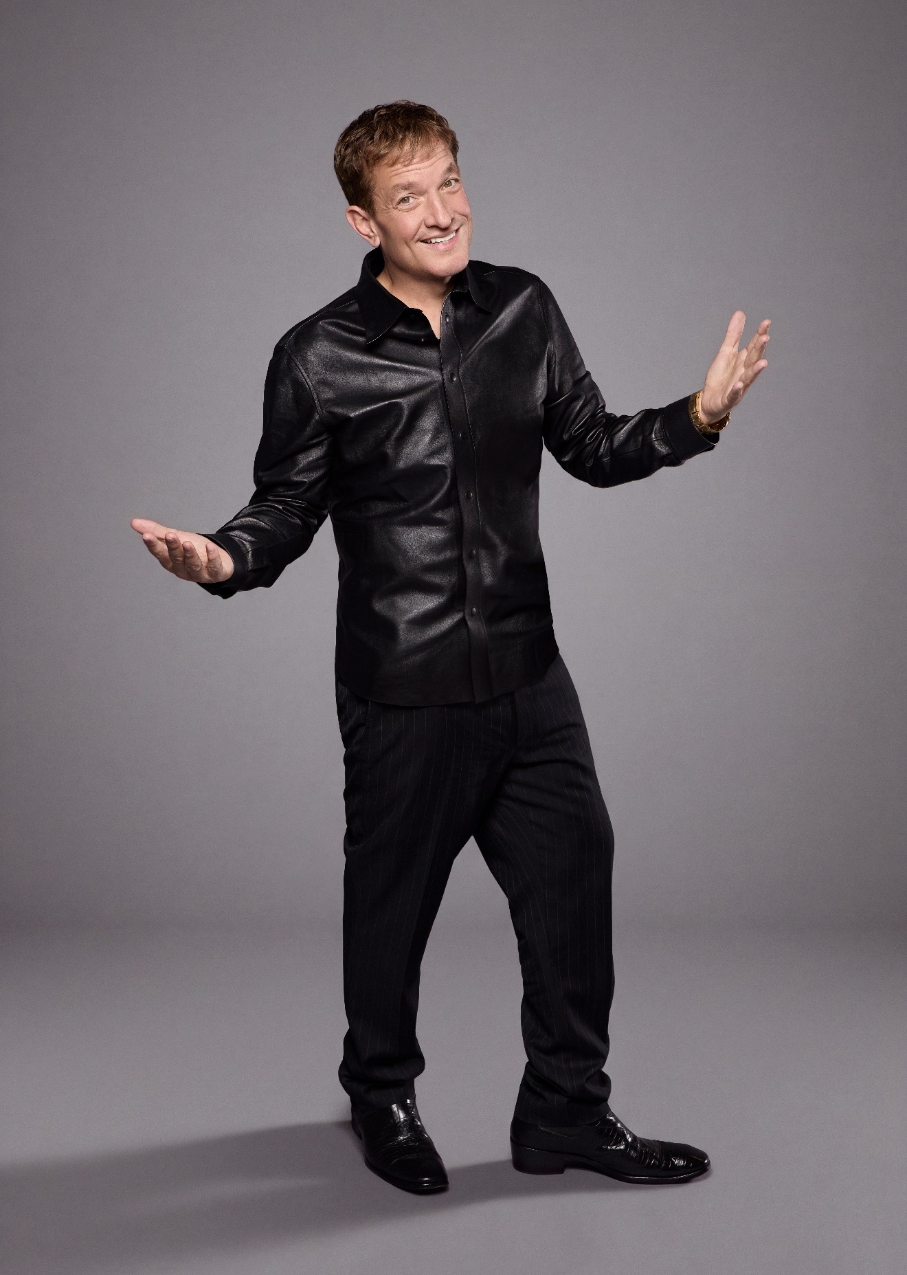 Jeff Beacher in a black leather shirt